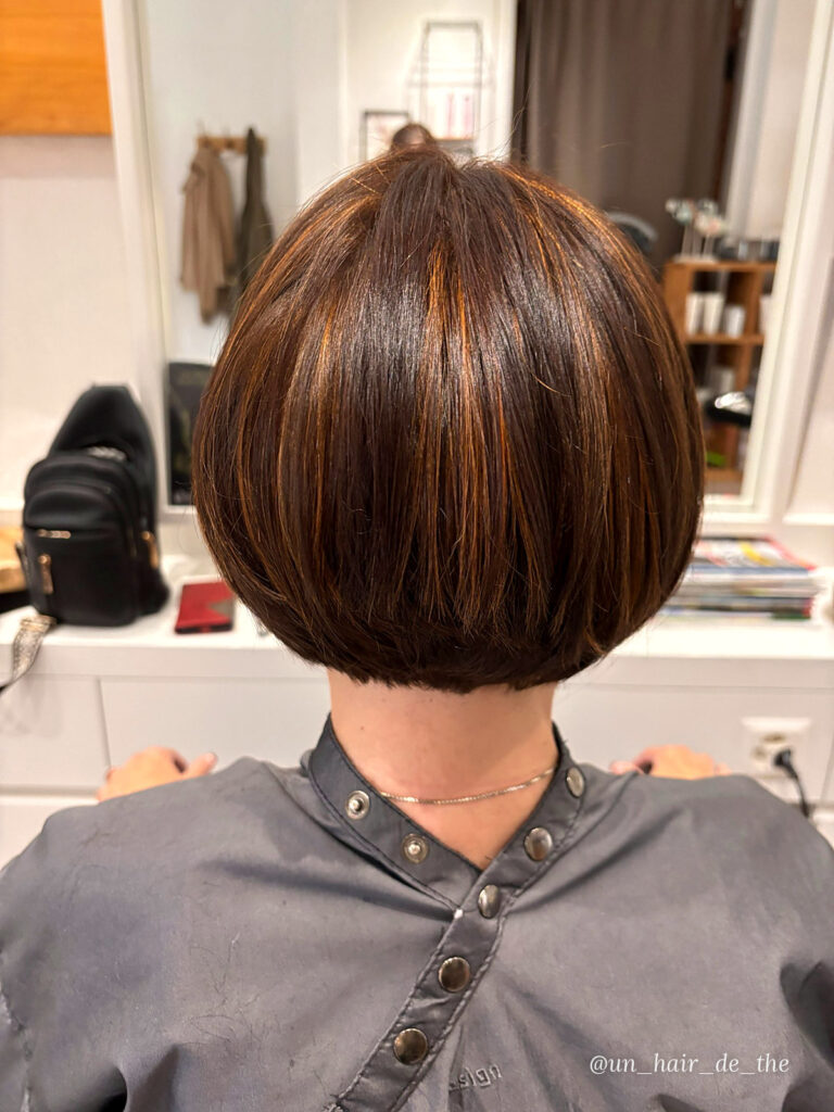 Short brown bob with copper highlights